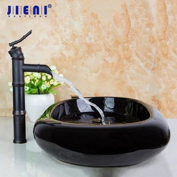 JIENI Черная овальная керамическая мойка, Художественная Европейская столешница, раковина для ванной комнаты с бронзовым водопадным краном, натертым маслом